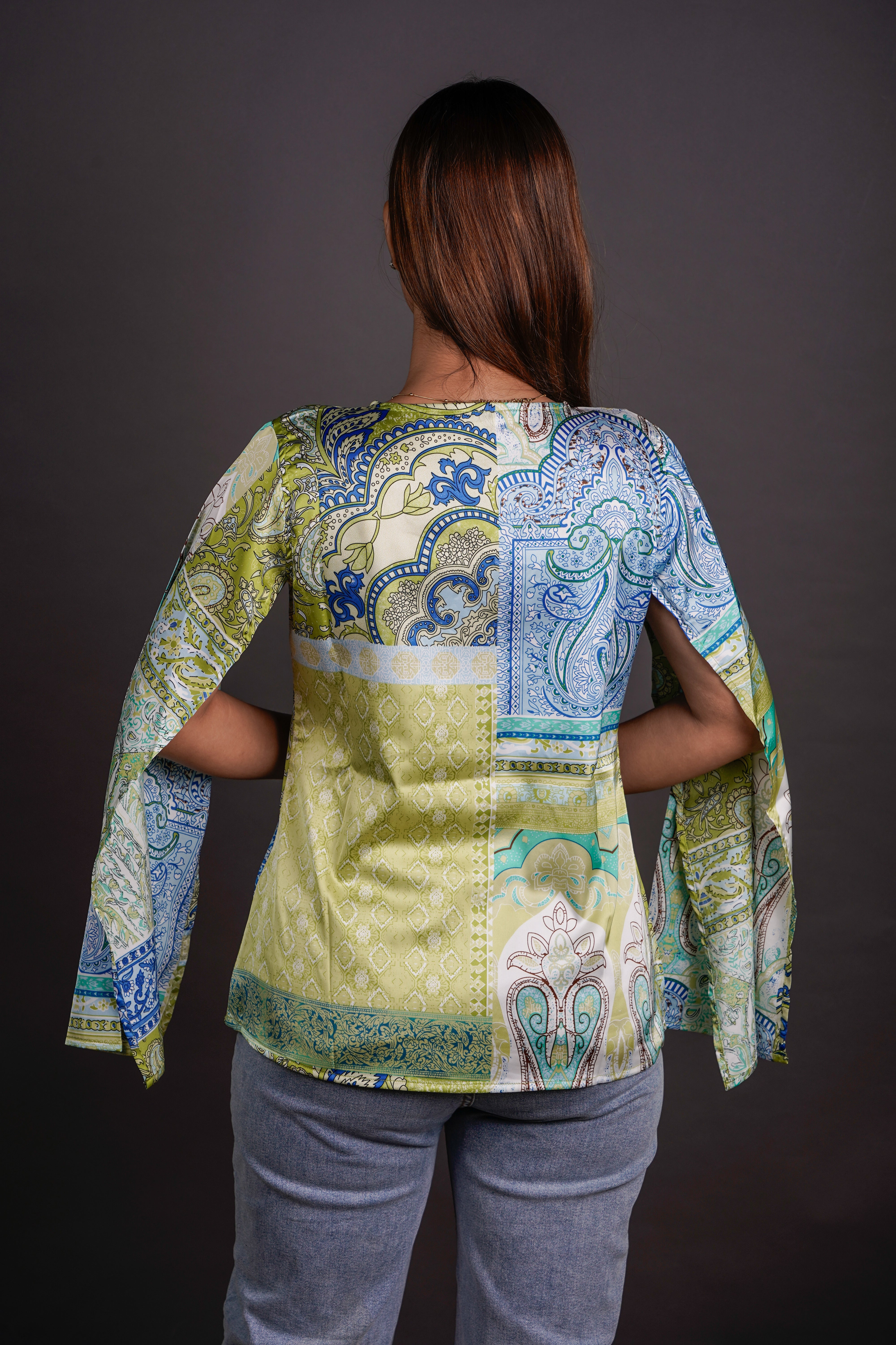 The Draped Statement Top